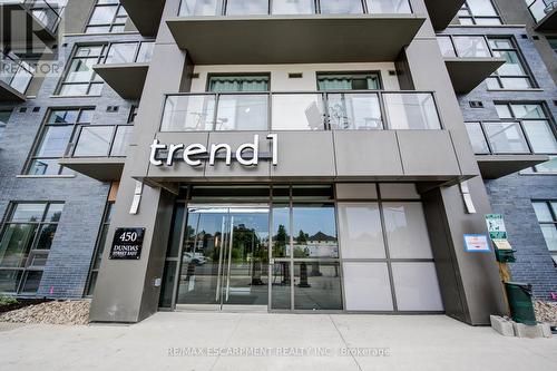 715 - 450 Dundas Street E, Hamilton, ON - Outdoor With Balcony With Facade