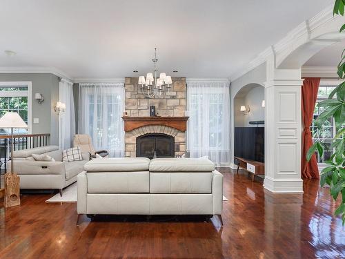 Salon - 3380 Rue De Bavière, Longueuil (Le Vieux-Longueuil), QC - Indoor Photo Showing Living Room With Fireplace