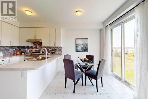 104 Edminston Drive, Centre Wellington, ON - Indoor Photo Showing Kitchen With Double Sink