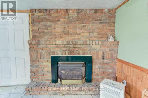 410 Queen Street S, Minto, ON - Indoor With Fireplace