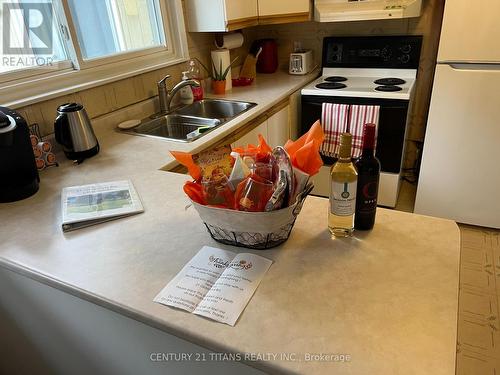 21 Glassford Road, Kawartha Lakes, ON - Indoor Photo Showing Kitchen With Double Sink