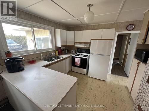 21 Glassford Road, Kawartha Lakes, ON - Indoor Photo Showing Kitchen With Double Sink