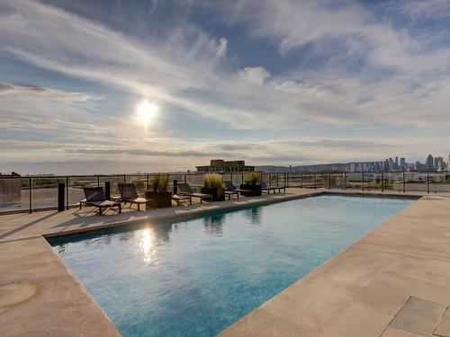 Piscine - 429-201 Rue Jacques-Le Ber, Montréal (Verdun/Île-Des-Soeurs), QC - Outdoor With In Ground Pool With View