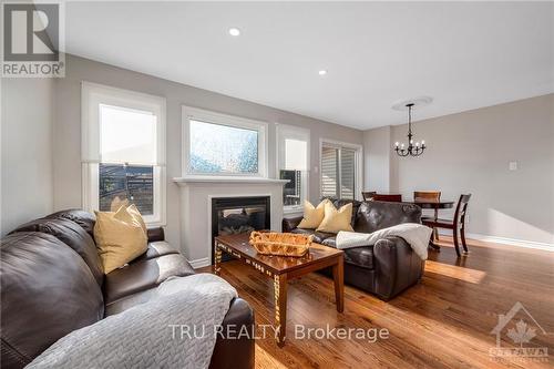 960 Linaria Walk, Ottawa, ON - Indoor Photo Showing Living Room With Fireplace