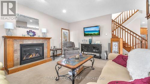 145 West Park Drive, North Middlesex (Parkhill), ON - Indoor Photo Showing Living Room With Fireplace