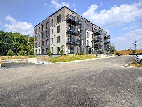 Back facade - 406-4995 Rue Des Ormes, Contrecoeur, QC - Outdoor With Facade