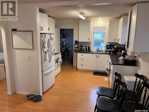 1508 H Avenue N, Saskatoon, SK - Indoor Photo Showing Kitchen With Double Sink