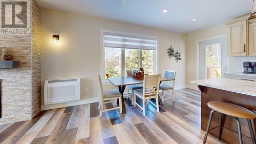 167 Indian Pond Drive, Conception Bay South, NL - Indoor Photo Showing Dining Room With Fireplace