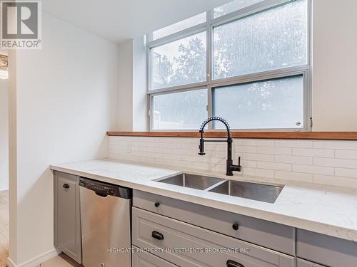 101 - 233 Beecroft Road, Toronto, ON - Indoor Photo Showing Kitchen With Double Sink