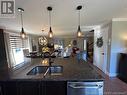 31 Simon Street, Charlo, NB  - Indoor Photo Showing Kitchen With Double Sink 