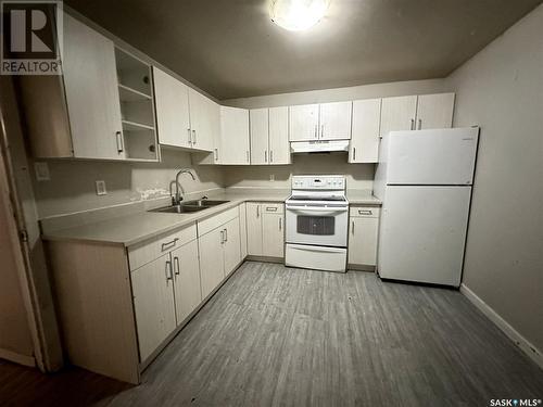 704 P Avenue N, Saskatoon, SK - Indoor Photo Showing Kitchen With Double Sink