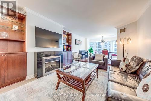 910 - 33 University Avenue, Toronto, ON - Indoor Photo Showing Living Room With Fireplace