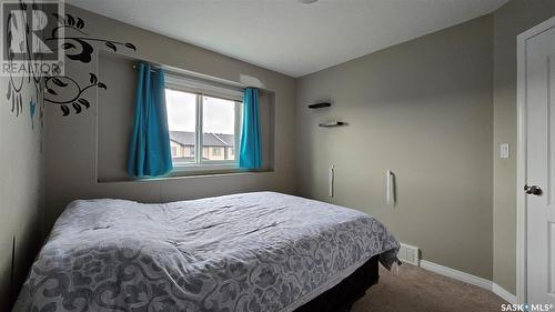 709 3806 Dewdney Avenue E, Regina, SK - Indoor Photo Showing Bedroom