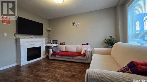 709 3806 Dewdney Avenue E, Regina, SK - Indoor With Fireplace