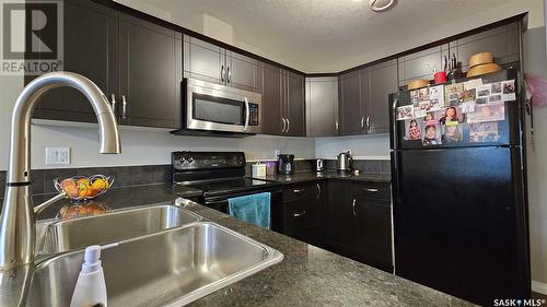 709 3806 Dewdney Avenue E, Regina, SK - Indoor Photo Showing Kitchen With Double Sink