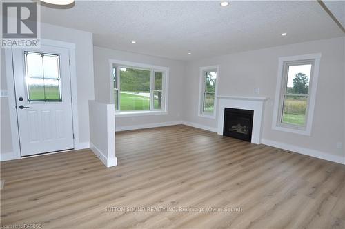 397802 10Th Concession, Meaford, ON - Indoor Photo Showing Living Room With Fireplace