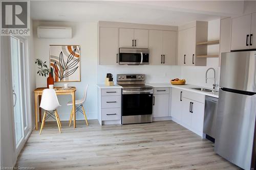 Upper Unit Kitchen - Virtually Staged - 184 Burris Street, Hamilton, ON - Indoor Photo Showing Kitchen With Double Sink