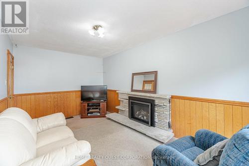 2277 Springfield Court, Mississauga, ON - Indoor Photo Showing Living Room With Fireplace