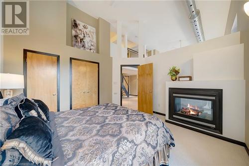 73 Garfield Avenue S Unit# 2A, Hamilton, ON - Indoor Photo Showing Bedroom With Fireplace