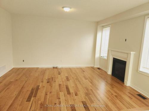 Upper-999 Black Cherry Dr, Oshawa, ON - Indoor Photo Showing Other Room With Fireplace