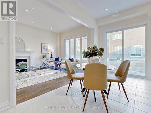 19 Aida Place, Richmond Hill, ON - Indoor Photo Showing Dining Room With Fireplace