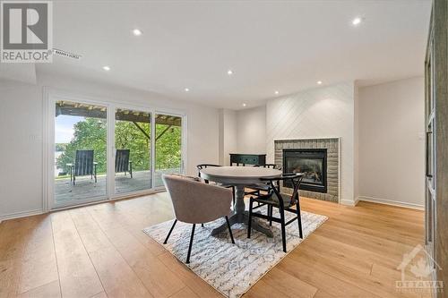 1463 Big Rideau North Shore Road, Perth, ON - Indoor Photo Showing Other Room With Fireplace