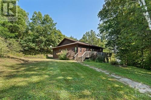 1463 Big Rideau North Shore Road, Tay Valley, ON - Outdoor With Deck Patio Veranda