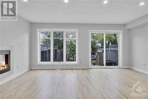 213 Hidden Meadow Avenue, Ottawa, ON - Indoor Photo Showing Living Room With Fireplace