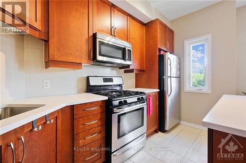 27 - 1112 Georgeton Pvt, Ottawa, ON - Indoor Photo Showing Kitchen With Stainless Steel Kitchen