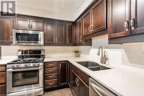 2880 Headon Forest Drive Unit# 18, Burlington, ON - Indoor Photo Showing Kitchen With Stainless Steel Kitchen With Double Sink