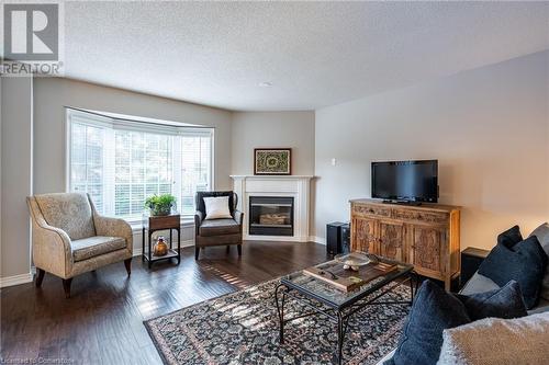 2880 Headon Forest Drive Unit# 18, Burlington, ON - Indoor Photo Showing Living Room With Fireplace