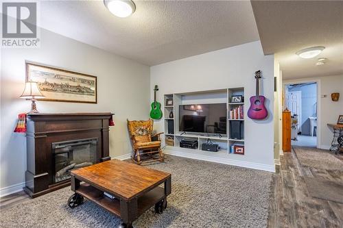 2880 Headon Forest Drive Unit# 18, Burlington, ON - Indoor Photo Showing Living Room With Fireplace