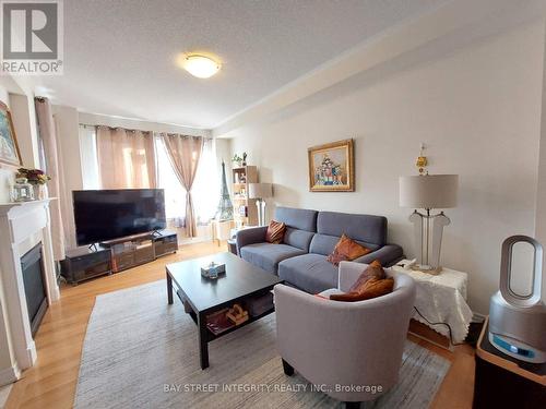 57 Cinemark Avenue, Markham, ON - Indoor Photo Showing Living Room With Fireplace