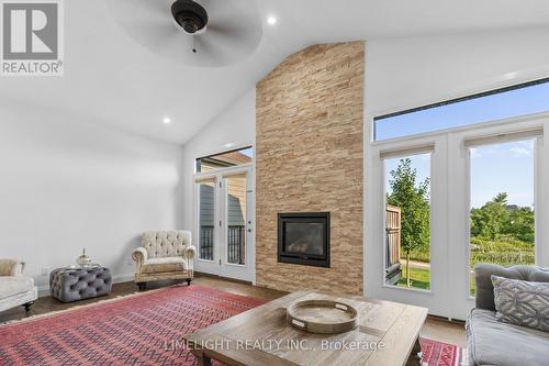 302 Callaway Road, London, ON - Indoor Photo Showing Living Room With Fireplace