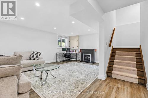 302 Callaway Road, London, ON - Indoor Photo Showing Living Room With Fireplace