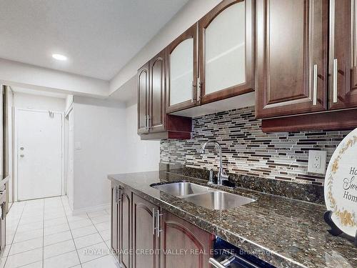 703-90 Ling Rd, Toronto, ON - Indoor Photo Showing Kitchen With Double Sink