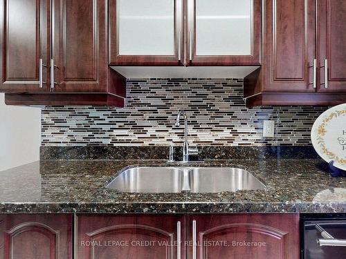 703-90 Ling Rd, Toronto, ON - Indoor Photo Showing Kitchen With Double Sink