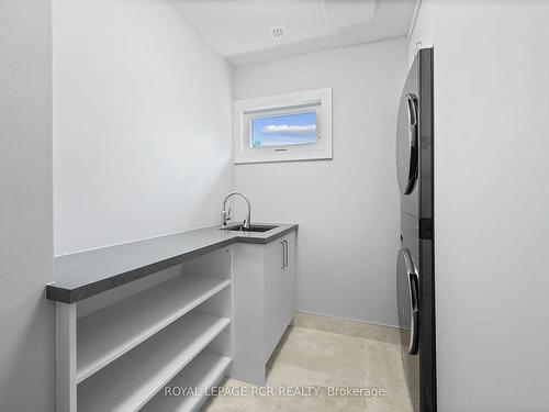 127 Clearbrooke Circ, Toronto, ON - Indoor Photo Showing Laundry Room