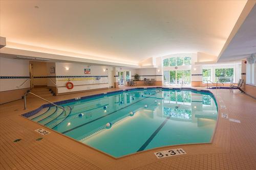 4187 Gallaghers Crescent, Kelowna, BC - Indoor Photo Showing Other Room With In Ground Pool