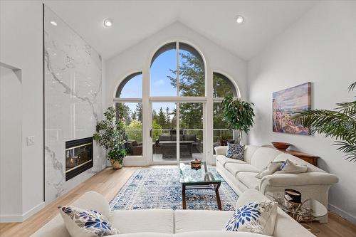 4187 Gallaghers Crescent, Kelowna, BC - Indoor Photo Showing Living Room With Fireplace