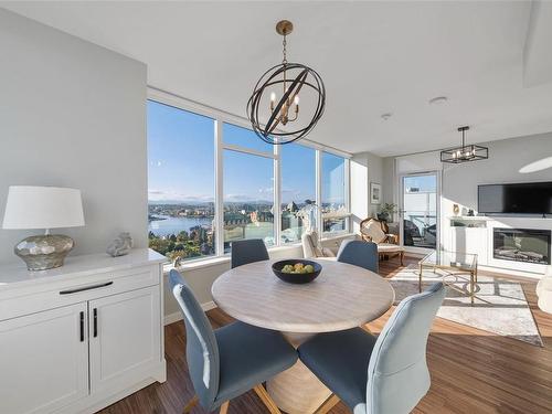 1505-777 Belleville St, Victoria, BC - Indoor Photo Showing Dining Room With Fireplace