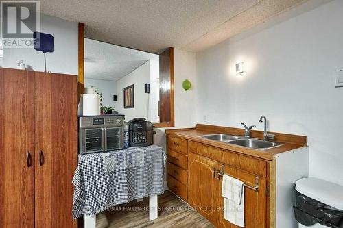 11 Jane Avenue, Clarington (Courtice), ON - Indoor Photo Showing Kitchen With Double Sink