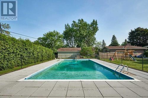 11 Jane Avenue, Clarington (Courtice), ON - Outdoor With In Ground Pool With Backyard