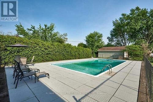 11 Jane Avenue, Clarington (Courtice), ON - Outdoor With In Ground Pool With Backyard