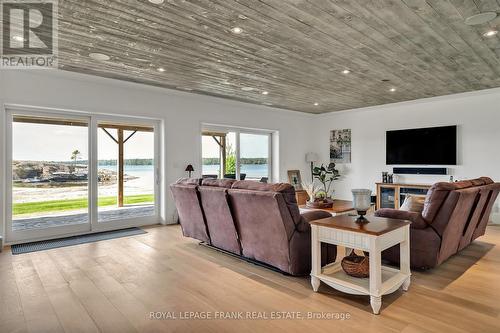 3790 County Road 6, North Kawartha, ON - Indoor Photo Showing Living Room With Fireplace