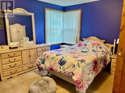 1421 Ainsworth Avenue, Riondel, BC - Indoor Photo Showing Bedroom