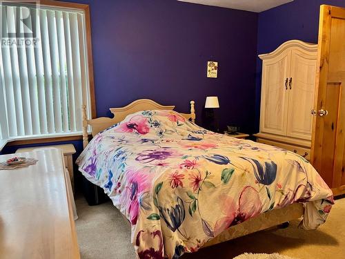 1421 Ainsworth Avenue, Riondel, BC - Indoor Photo Showing Bedroom