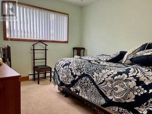 1421 Ainsworth Avenue, Riondel, BC - Indoor Photo Showing Bedroom