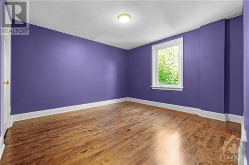 Very spacious secondary bedroom with hardwood floors. - 11 Gilchrist Avenue, Ottawa, ON - Indoor Photo Showing Other Room