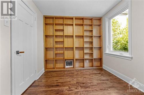 Practical shelving in 3rd bedroom is ideal for a home office/ student/ reading room. - 11 Gilchrist Avenue, Ottawa, ON - Indoor Photo Showing Other Room